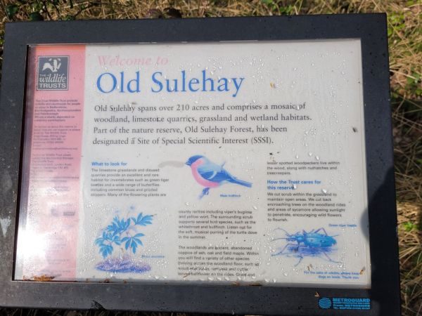 Notice board depicting a welcome description to the National Trust site